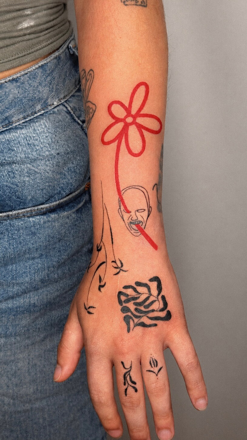 Freehand abstract tattoo, hand and fingers, floral and linework motif, Valencia