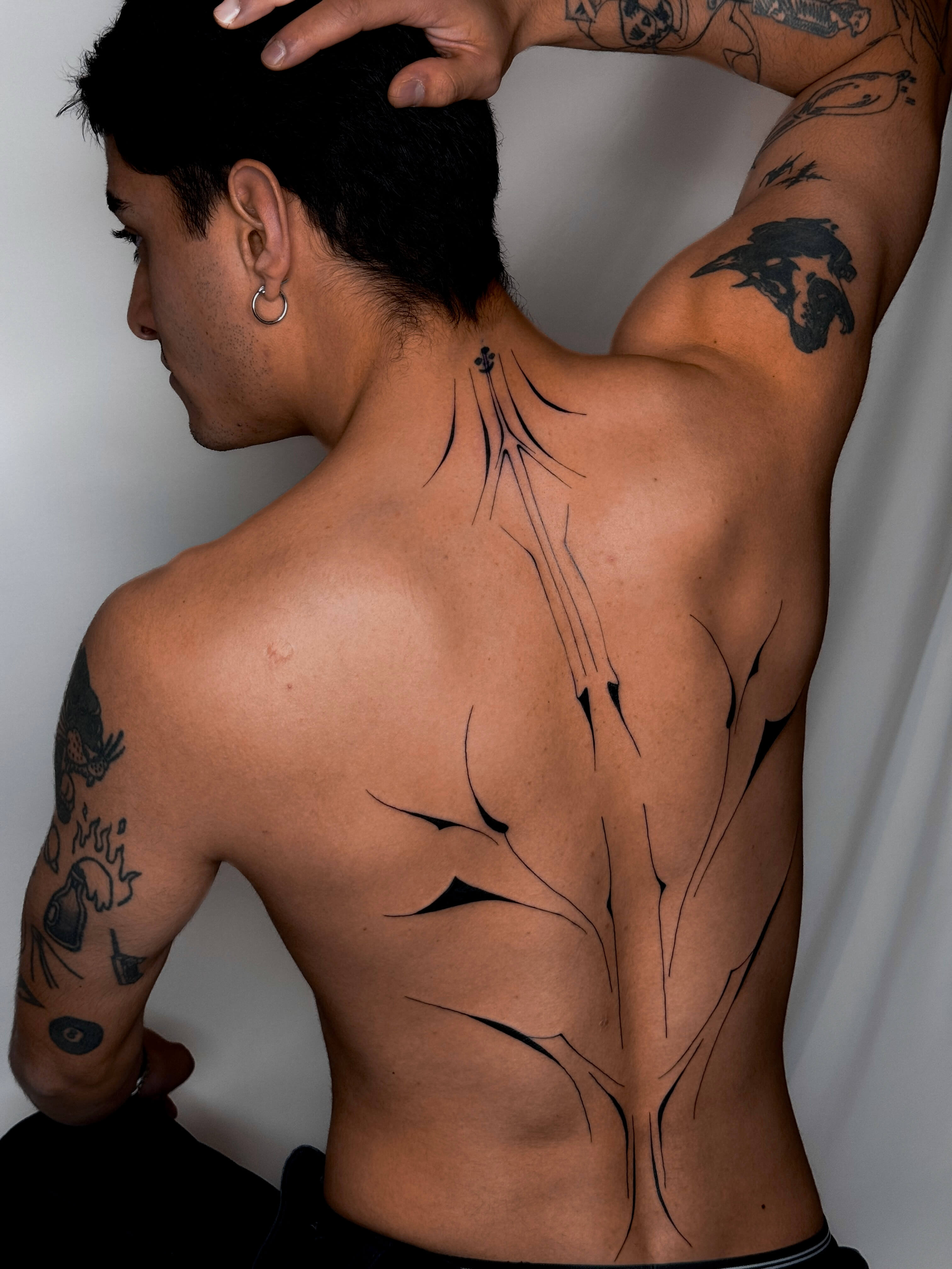 Custom blackwork abstract piece on the back
