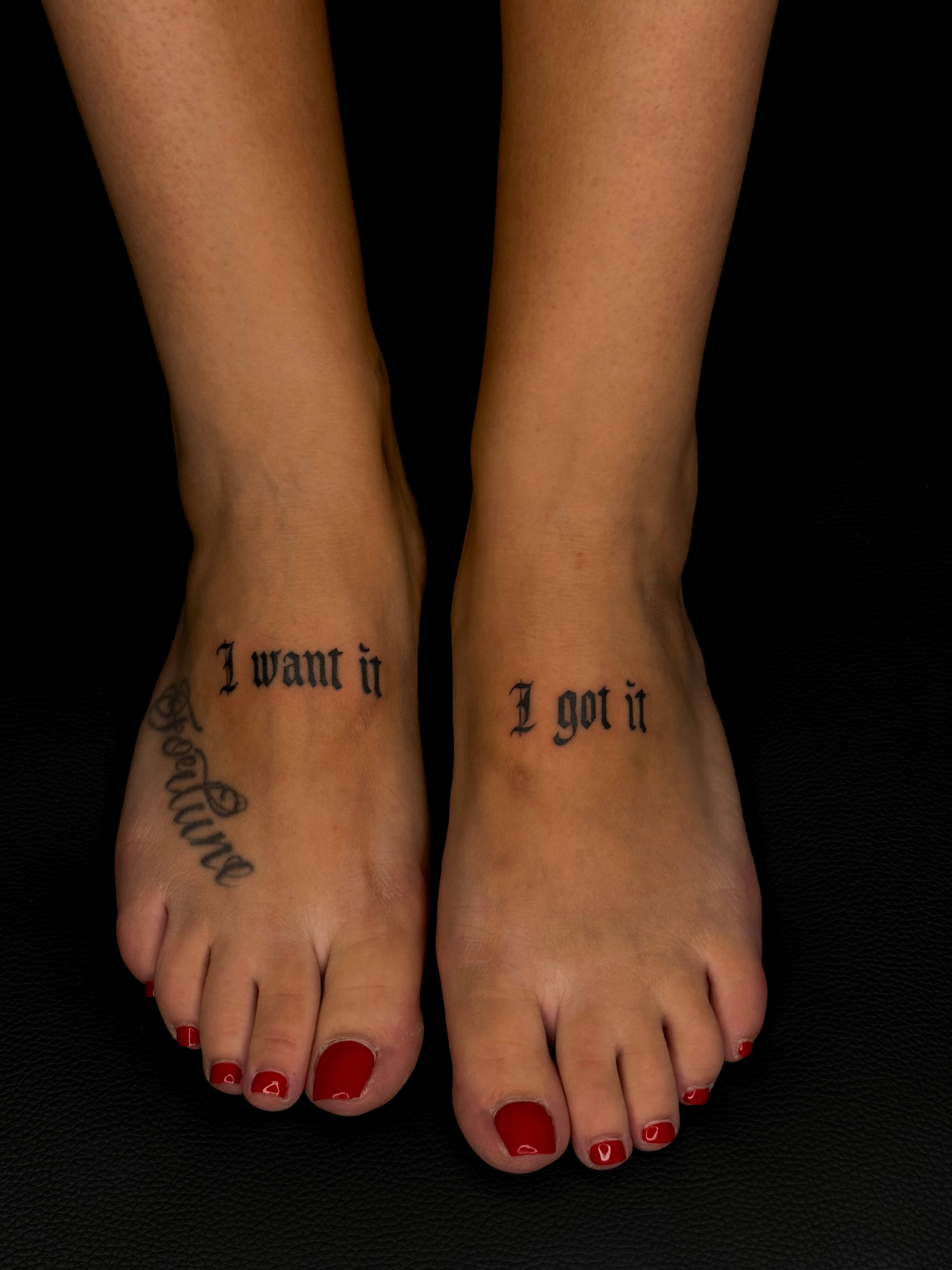 Lettering tattoo on the foot